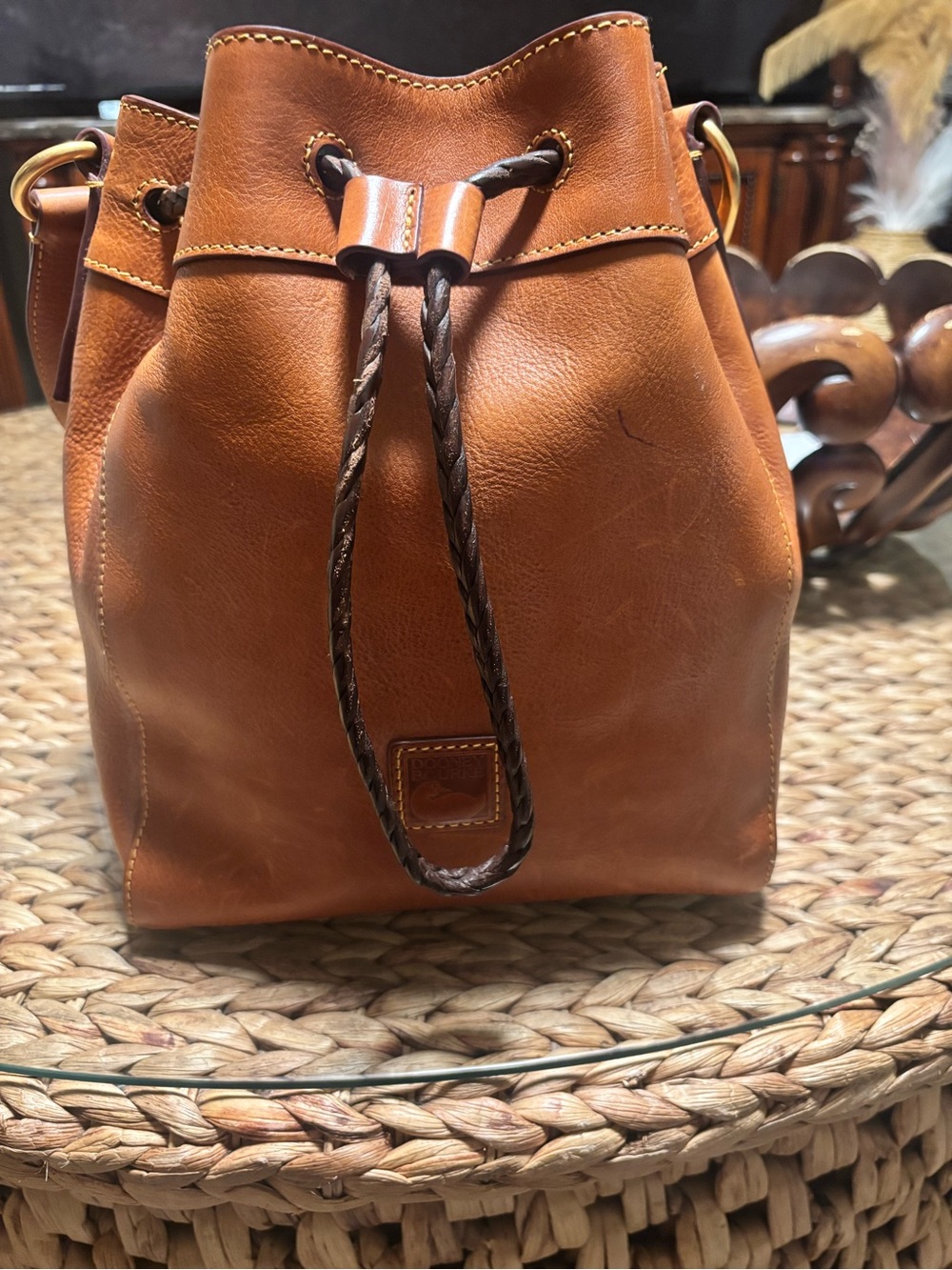Dooney and Bourke Hattie Florentine Leather Drawstring Bucket Bag.